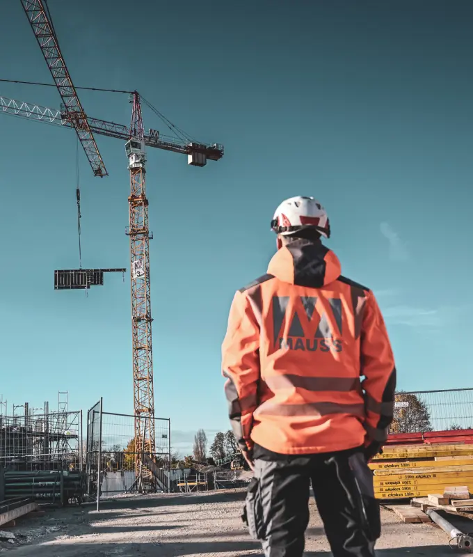 MAUSS BAU Mitarbeiter bei der Arbeit auf einer Baustelle